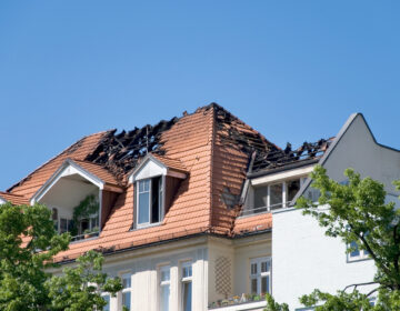 public adjuster inspecting fire damage - fire damage claims florida